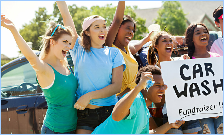 A group of cheerleaders enthusiastically wash cars, splashing water and scrubbing with soapy sponges, showcasing teamwork and enthusiasm.
